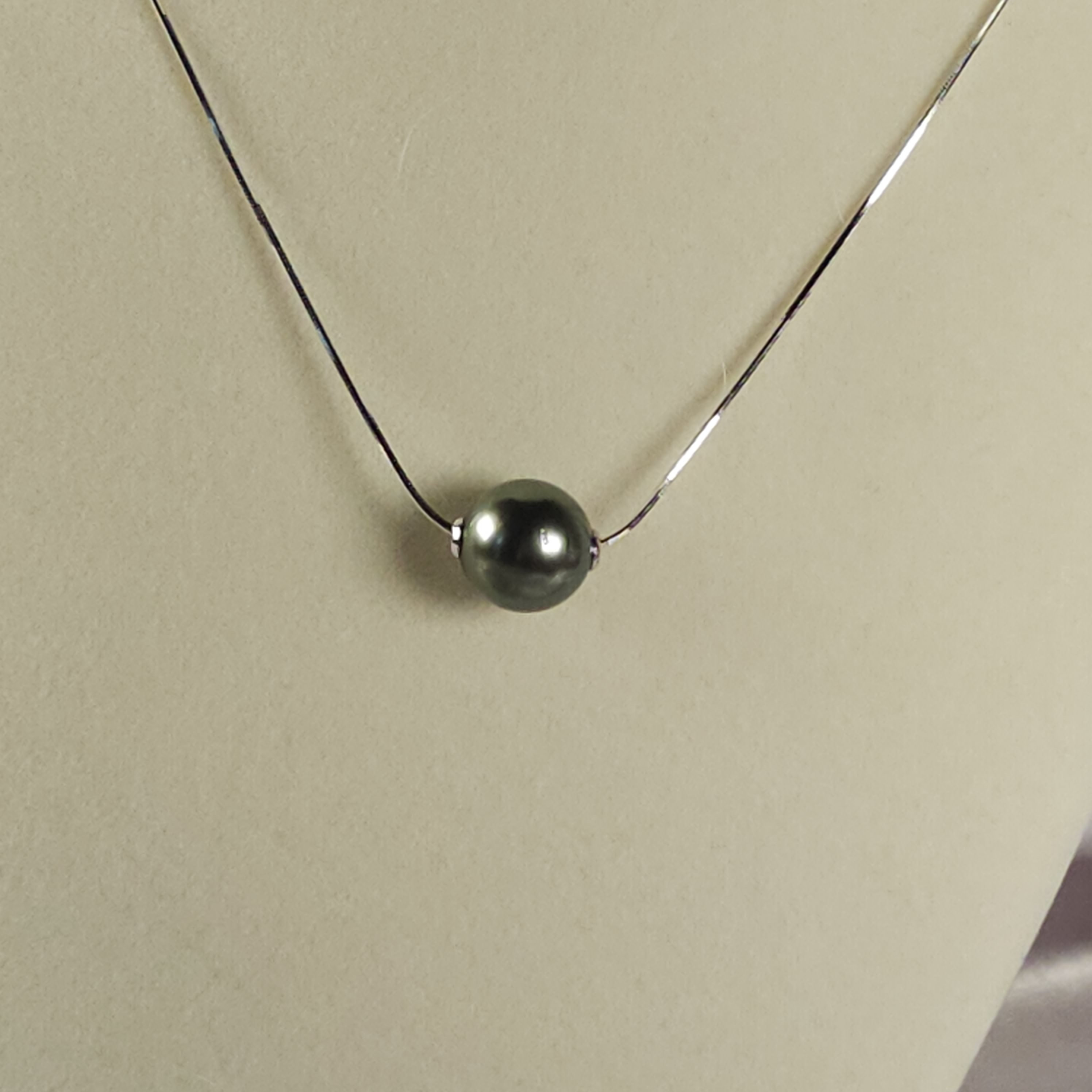Genuine Black Tahitian pearl necklace on a .925 sterling silver snake chain (adjustable up to 18 inches)